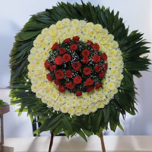 Corona tipo dona con rosa roja